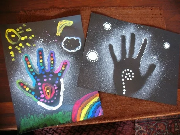 Aboriginal style dot painting of hands