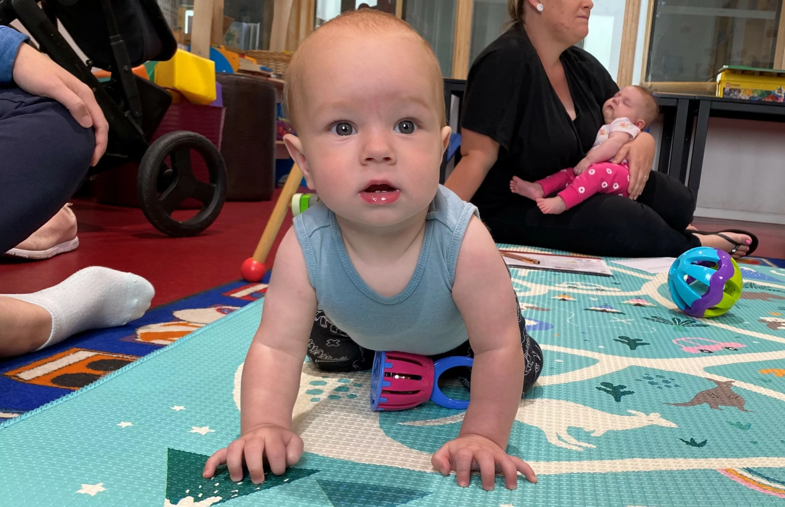 Baby doing tummy time on a mat