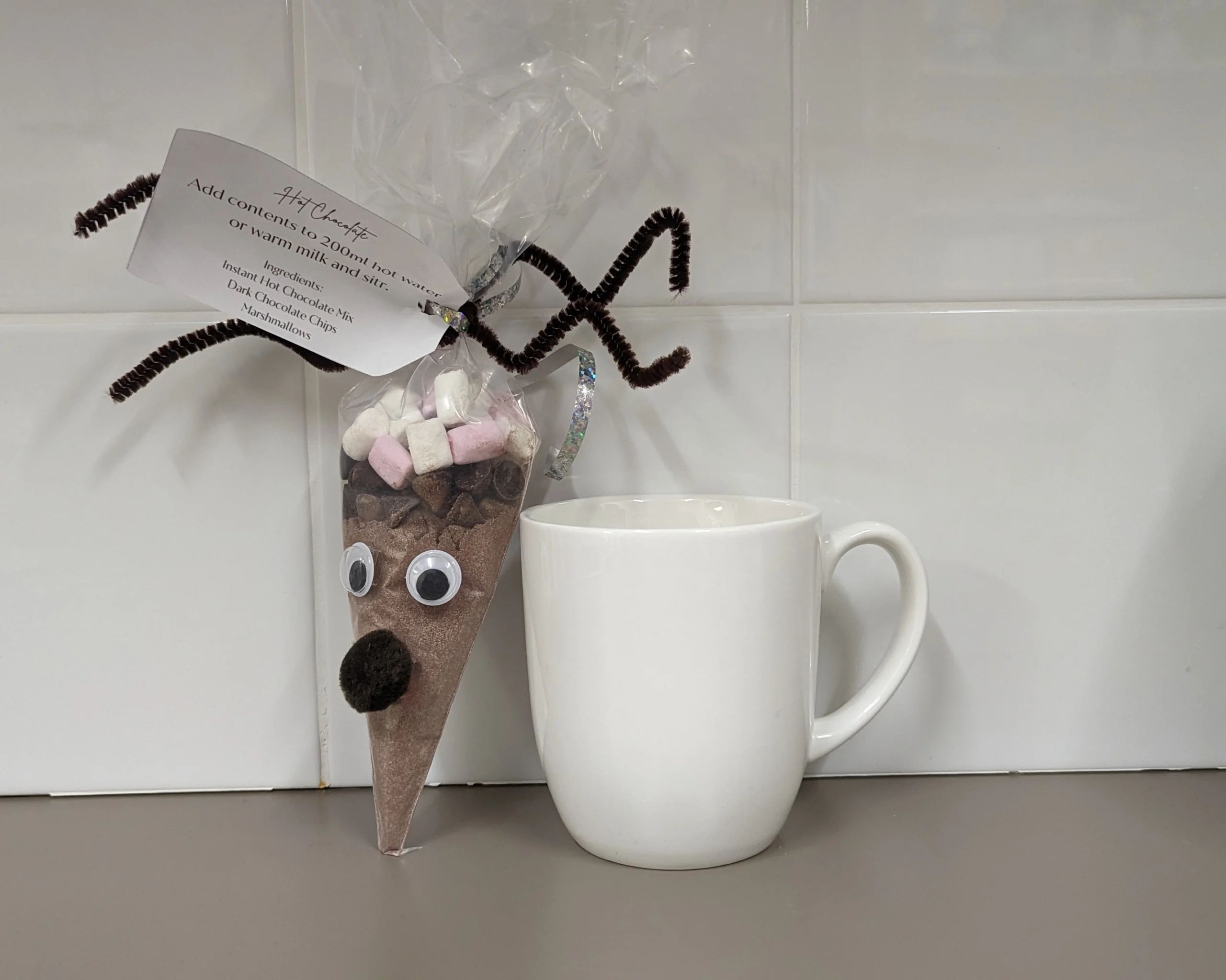 Image of a hot chocolate kit shaped like a cartoon reindeer