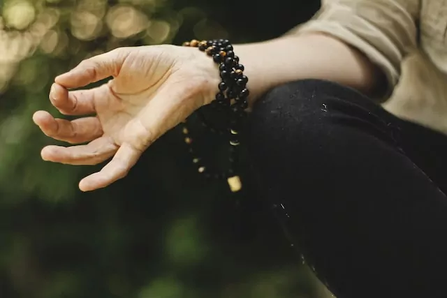 close up photo of hands in meditation pose