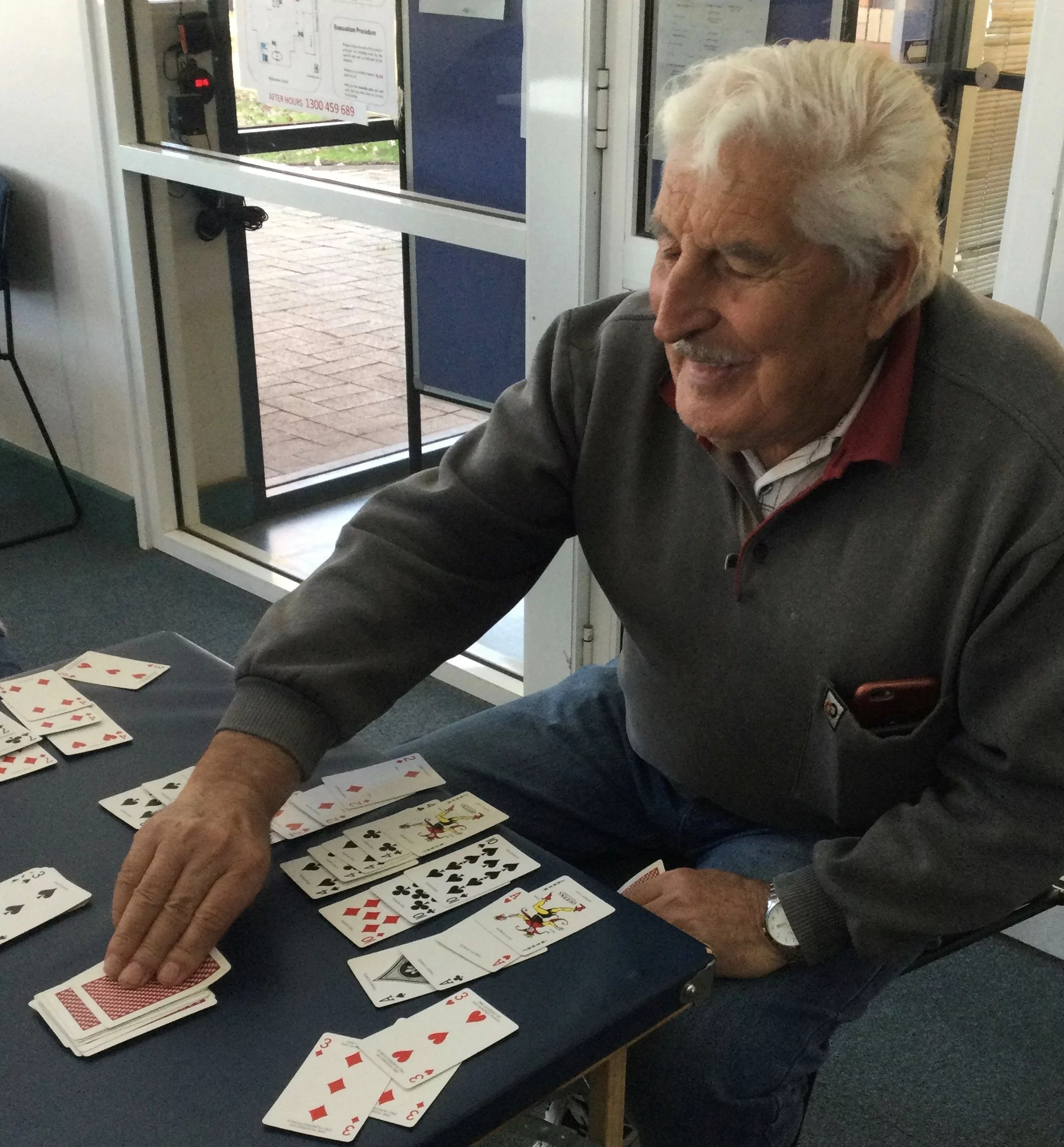 Gentleman playing cards