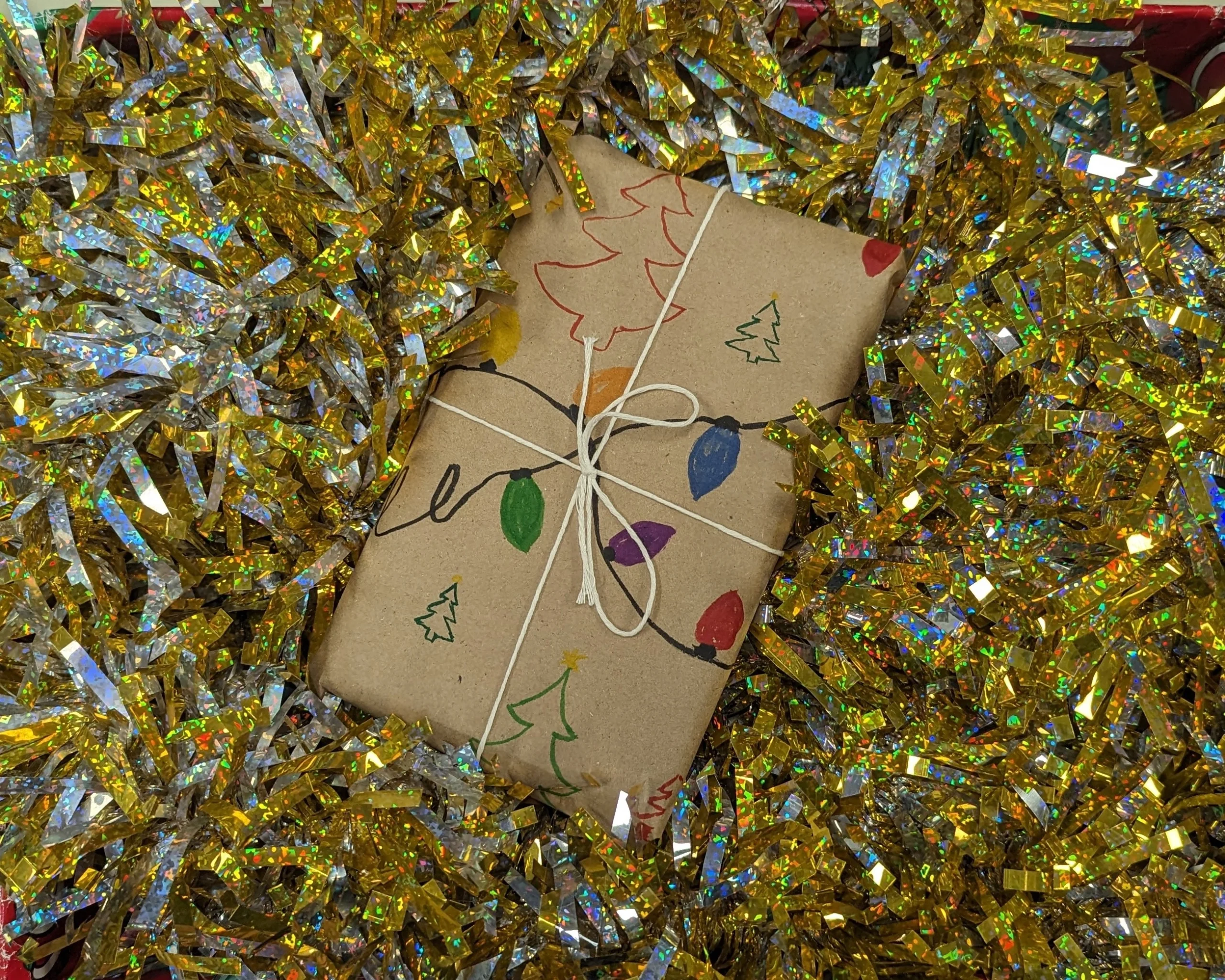 A gift wrapped in home-made wrapping paper