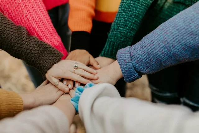 Hands joined together in solidarity