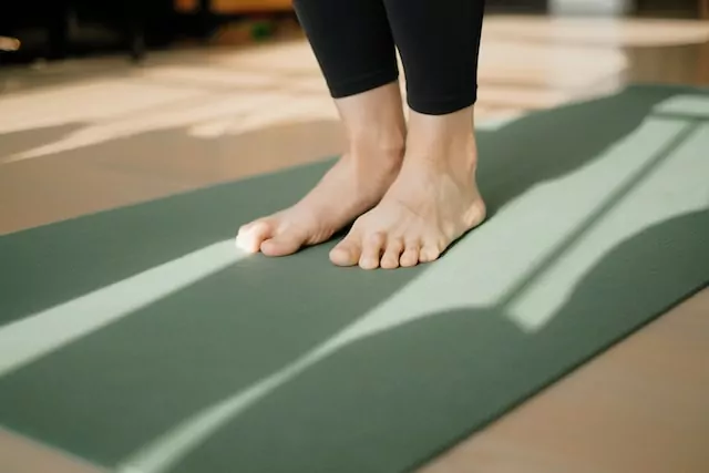 Feet on a yoga mat